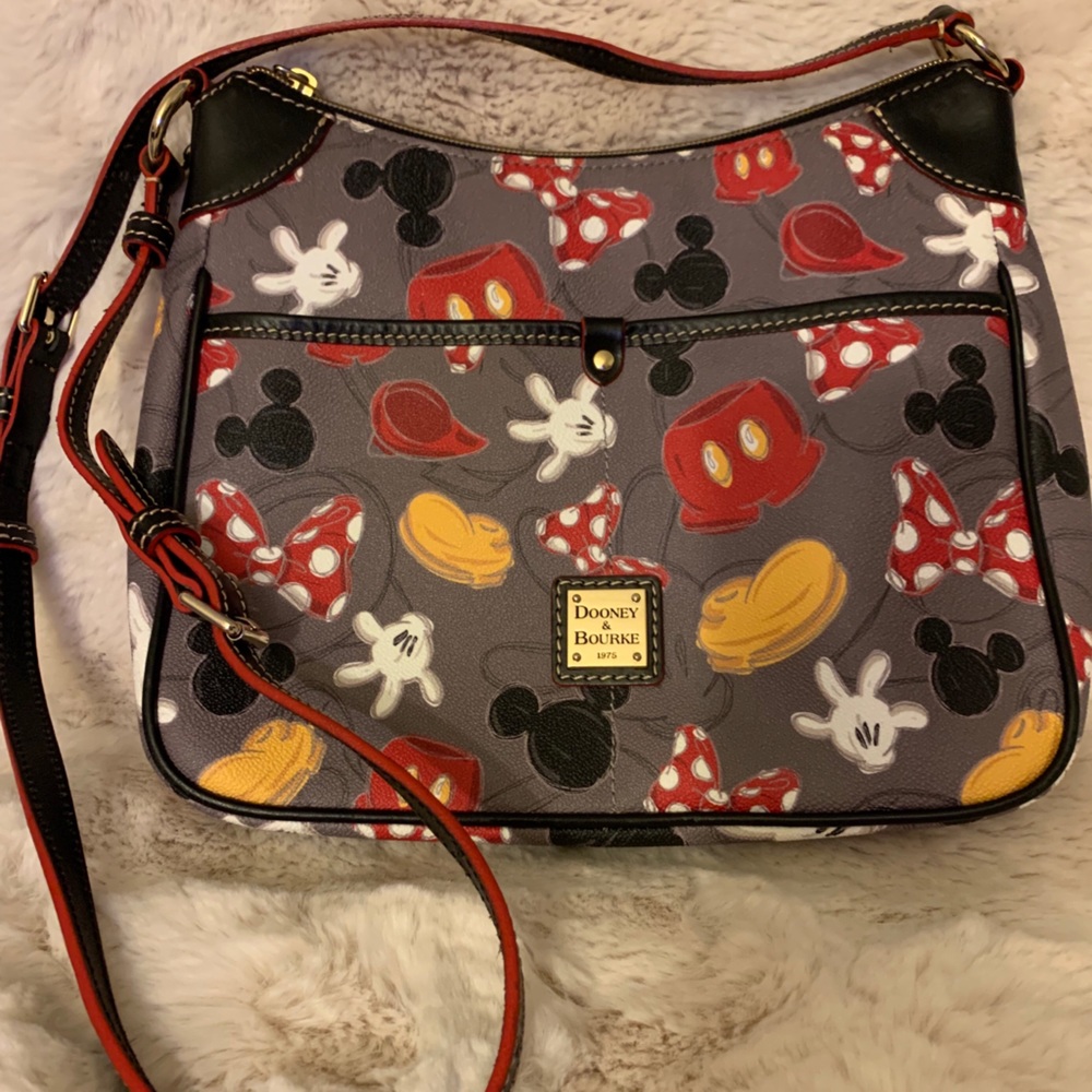 Dooney &  Bourke Disney “Body Parts” crossbody.